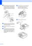 Page 4236
dLift the machine from the front and hook 
the tab of the green protective part into 
the keyed opening (1) on the bottom of 
the paper tray. Then latch the protective 
part over the raised portion of the paper 
tray (2).
 
eUnplug the machine from the telephone 
wall socket and take the telephone line 
cord out of the machine.
fUnplug the machine from the electrical 
socket.
gUsing both hands, use the plastic tabs 
on both sides of the machine to lift the 
scanner cover until it locks securely into...