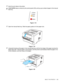 Page 25ABOUT THIS PRINTER   1 - 18
3Send the print data to the printer.
4Open the manual feed tray. Slide the paper guides to fit the paper size.
Figure 1-19
5Using both hands put the paper in the manual feed tray until the front edge of the paper touches the 
paper feed roller. Hold the paper in this position until the printer automatically feeds the paper in for 
a short distance, and then let go of the paper.
Figure 1-20
A NO PAPER status is shown by the control panel LEDs until you put a sheet of paper in...