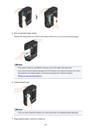 Page 9695.
Pull out jammed paper slowly.
Support the machine with your hand so that it does not fall over as you pull out the jammed paper.
Note
