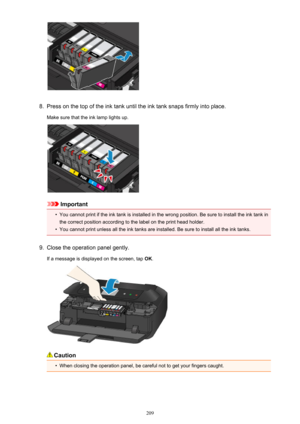 Page 2098.
Press on the top of the ink tank until the ink tank snaps firmly into place.
Make sure that the ink lamp lights up.
Important
