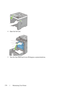 Page 380378Maintaining Your Printer
4Open the belt unit.
5Turn the four PHD lock levers 90-degrees counterclockwise.
 