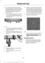 Page 3329. Turn the lead screw (where the lug
wrench attaches) of the jack by hand
to release the lug wrench from the jack.
Press the button on the wrench to
extend the handle. Fold down the
wrench socket.
10. Loosen each wheel lug nut one-half turn counterclockwise, but do not
remove them until the wheel is raised
off the ground. 11.
The vehicle jacking points are shown
here, and are depicted on the warning
label on the jack.
12. Small arrow-shaped marks on the sills show the location of the jacking
points. 13....