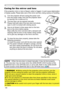 Page 106106
Caring for the mirror and lens
If the projection mirror or lens is flawed, soiled or fogged, it could cause deterioration 
of display quality. Please take care of the mirror and lens, being cautious of handling. 
1.Turn the projector off and unplug the power cord 
from the power outlet. And cool the projector down 
by leaving it for a while as it is.
2.The lens door can be opened manually.
Please hold both side of the lens door and slowly 
open it until it is locked with clicking sound.
3.Use an air...