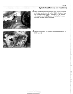 Page 139
Cylinder Head Removal  and Installation 
4 While maintaining  tension on timing chain, rotate crankshaft 
at  vibration damper from 
30 before TDC in direction  of rota- 
tion  (clockwise) until number 
1 cylinder  is  at TDC position 
with  line between  the 
OIT (arrow) on front  pulley lined up 
with  boss  on lower timing chain  cover.   