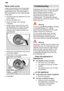 Page 20en
20
Waste
 water pump
Large  food remnants in the rinsing water
not retained by the filters may block the waste water pump. The rinsing water is then not pumped out and covers the filter .
In this case:
First disconnect the appliance from the power supply .
Remove the filters 27.
Scoop out water , use a sponge
if required.
Using a spoon, prise of f pump cover
(as illustrated) until it clicks, then grip the cover by the lug and first pull it upwards until it resists and then pull it out forwards.
Check...