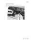 Page 131Repair information4-43
  4512-630
Tray 2 auto comp tire removal
Gently pull the rubber tire loose from the wheel, and replace it with a new tire.
Note:  Look at the nap of the tire, and orient the tire for highest friction when picking the paper. 