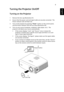 Page 199
EnglishTurning the Projector On/Off
Turning on the Projector
1 Remove the lens cap.(Illustration #1)
2 Ensure that the power cord and signal cable are securely connected.  The 
Power indicator LED will flash red.
3 Turn on the projector by pressing Power button on the control panel, 
and the Power indicator LED will turn blue.(Illustration #2)
4 Turn on your source (computer, notebook, video player ,etc.).  The 
projector will detect your source automatically.
• If the screen displays Lock and Source...