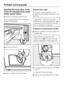 Page 46Opening the drum door in the
event of a blocked drain outlet
and/or power failure
Switch the washing machine off.
There is a lever behind the detergent
drawer fascia panel.
Remove the lever.

Use it to open the access flap.Blocked drain outlet
If the drain outlet is blocked, up to
25 litres of water will be retained in the
machine.
Caution: if laundry has been
washed at a high temperature, water
draining out of the machine will still
be hot. Danger of scalding!
Procedure for draining the machine...