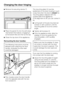 Page 58^Remove the securing deviceg.
^Place the panelbonto the soft-close
mechanism from above, engaging it
at the bottom first and then at the top.
^Close the top door of the appliance.
Remounting the door handles:
The following instructions must be
followed when attaching the door
handle, otherwise the door seal
could be damaged.
^
First, loosely screw the door handle
onto the opposite side with the two
front screwsb.The mounting platecmust be
positioned on the door housing in such
a way that when the door...