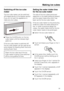 Page 39Switching off the ice cube
maker
The ice cube maker can be switched
off independently of the freezer section
if you do not want the appliance to
make any ice cubes.
^Press the On/Off button on the ice
cube maker until the indicator light
goes out.
If the ice cube maker is switched off,
the ice cube drawer can be used as an
extra drawer for freezing fresh food and
storing frozen food.
Clean the ice cube tray if the ice
cube maker is going to be switched
off for a long period of time.
Setting the water...