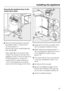 Page 49Securing the appliance door to the
custom door panel
^Secure the fixing bracket using the
pre-drilled holesausing the (4 x
14 mm) screwsb.
Ensure that the two metal edges are
flush (symbol//).
– Align depthZon the custom door:
Loosen the screws at the top of the
appliance doorscand the bottom of
the fixing bracketd. Adjust the
custom door to create a space of
1/16 (2 mm) between the custom
door and the front edge of the niche.^Close both the doors and align them
with the adjacent cabinetry doors.
^While...